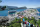 eMobility bilen kjører ned fra Aksla med panoramautsikt over Ålesund by.